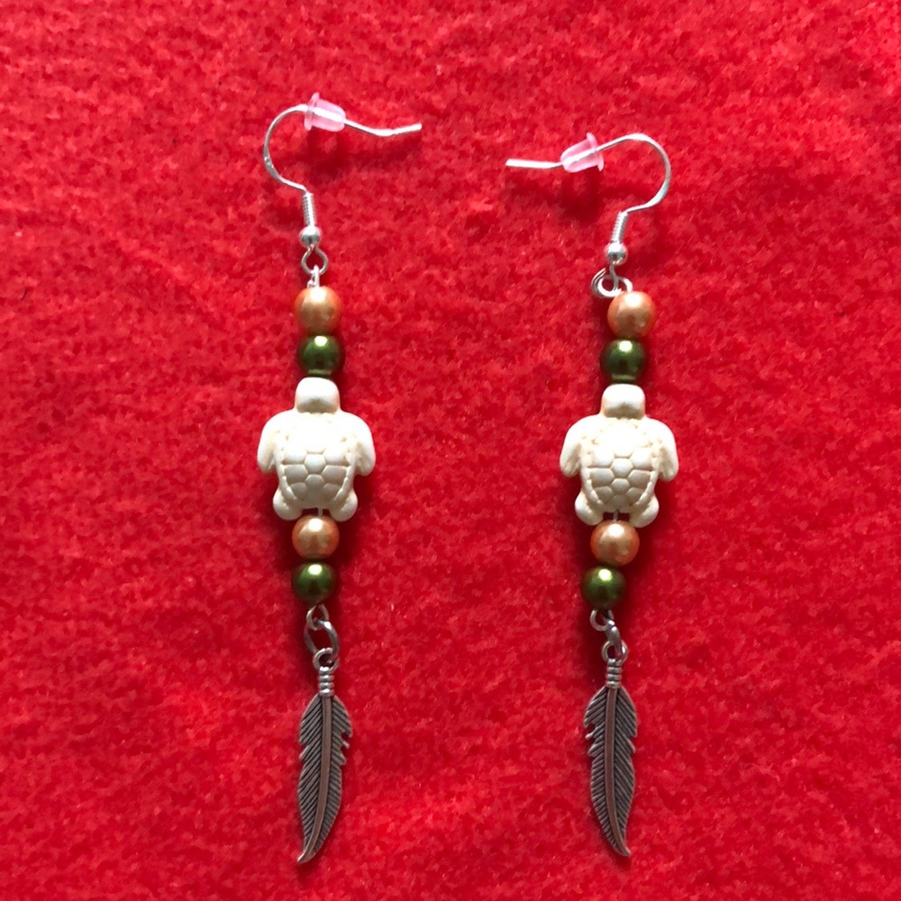 NWT, Handmade by A Charmed Life. White Turtle Earrings